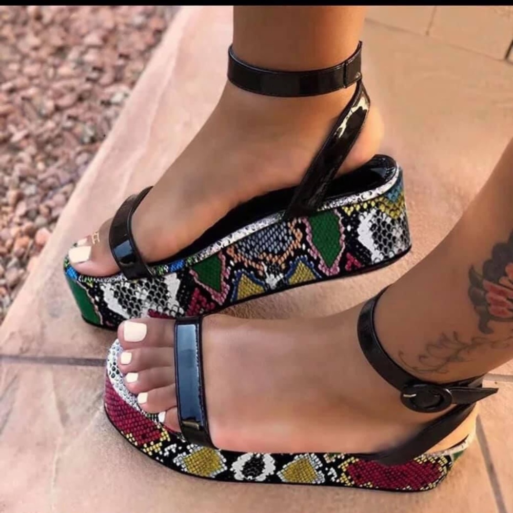 Black snakeskin platform sandals